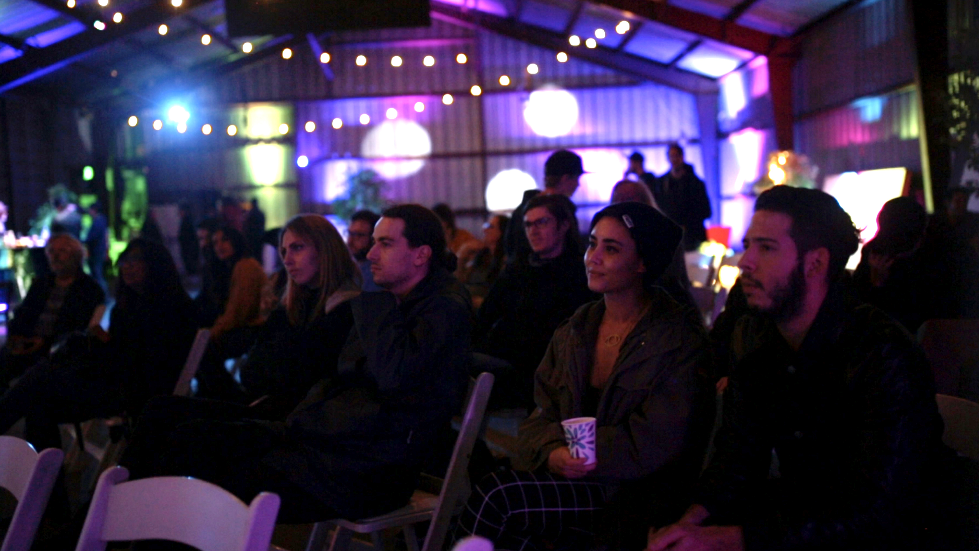 The audience watching Richard Grillotti present