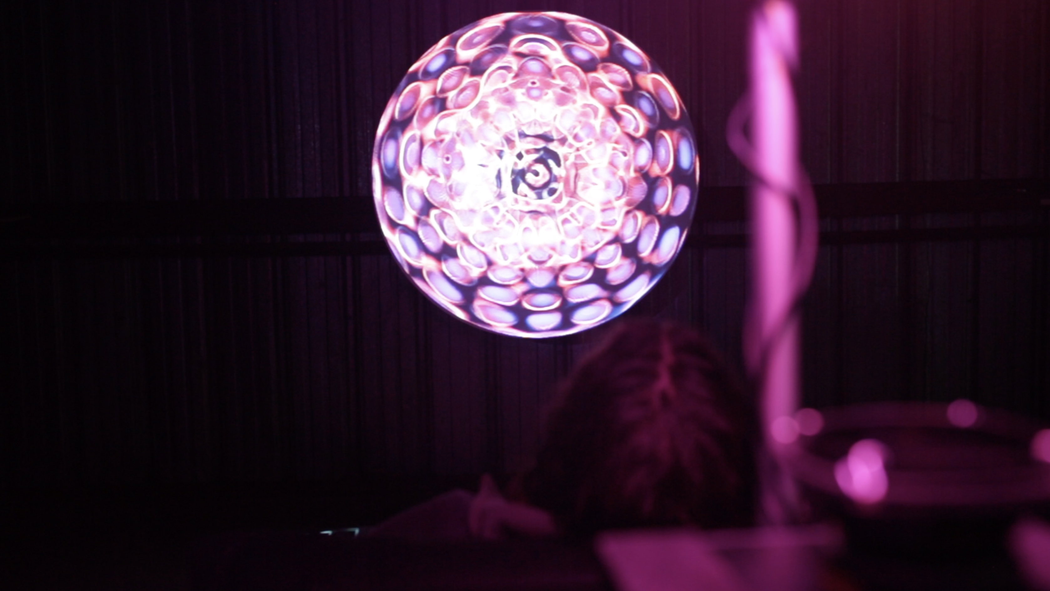 A visitor leaning into the deep vibrations
