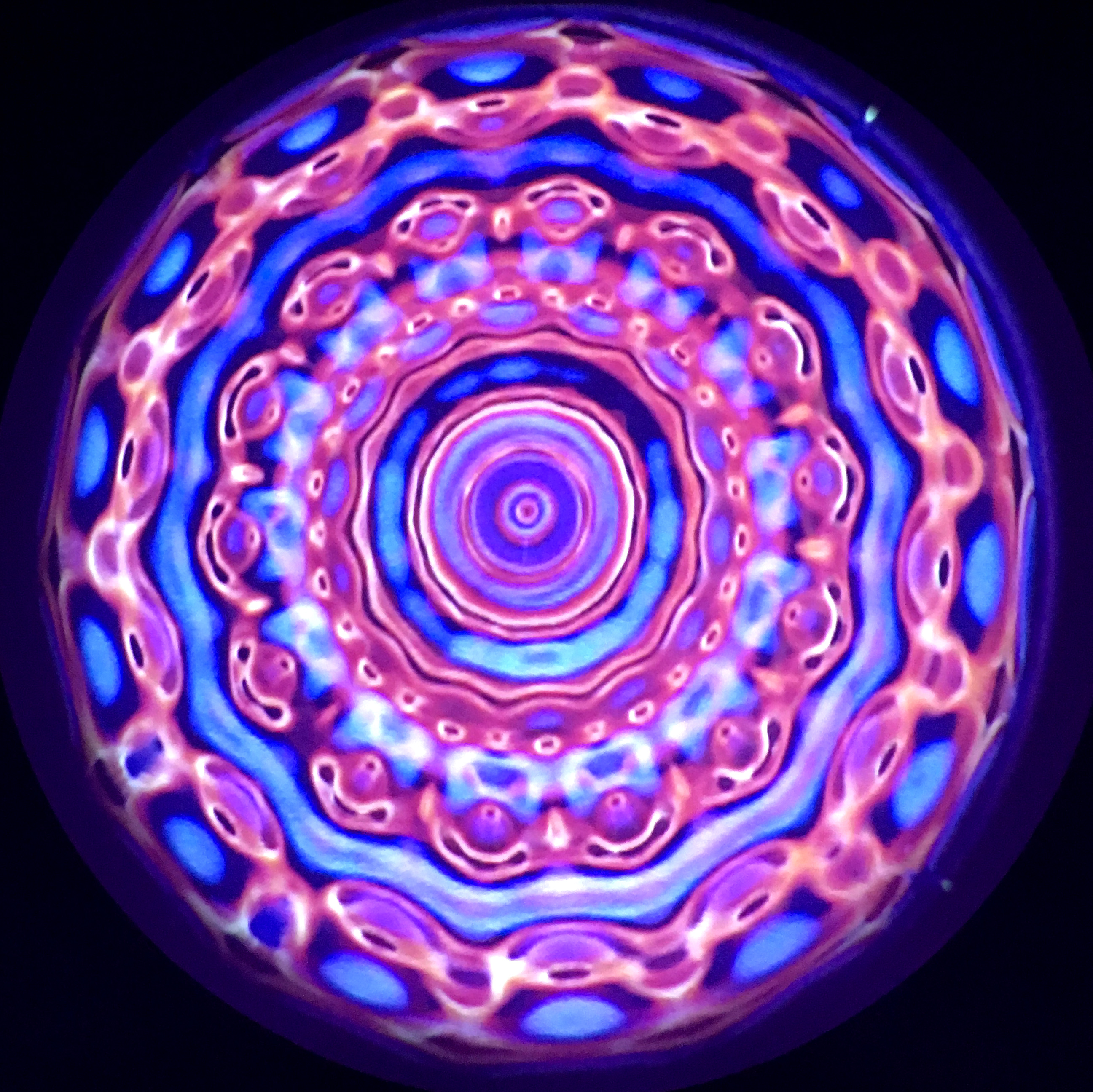 Exceptionally complex geometries in banded purple, pink and orange